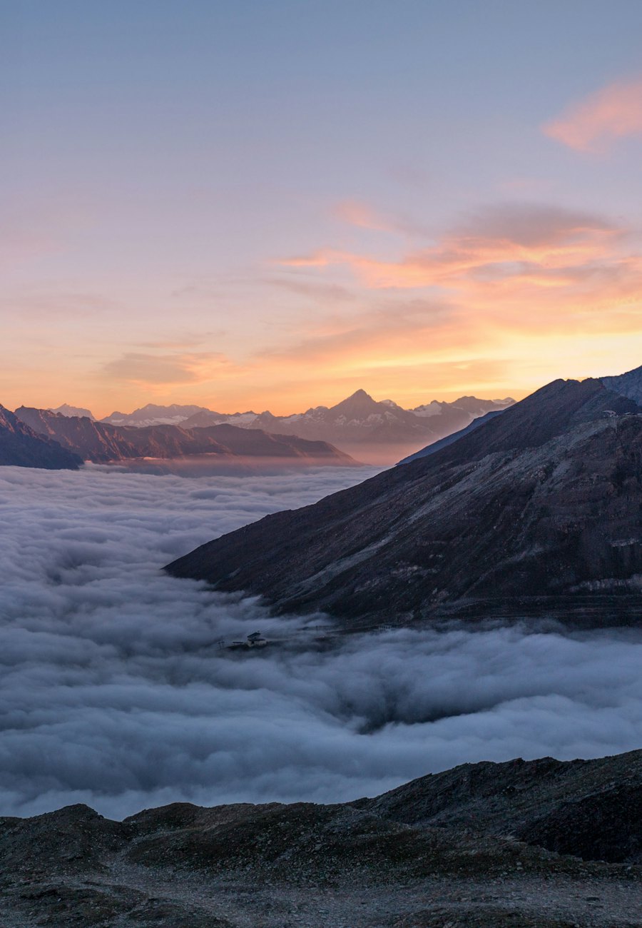 Mountain peaks above a sea of clouds